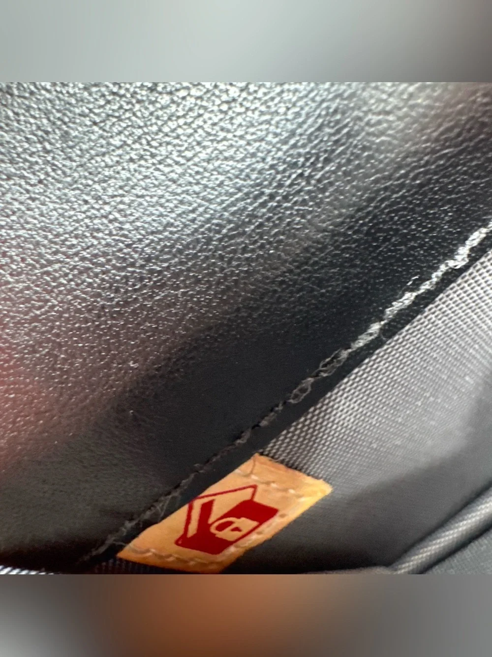 Tumi black leather
